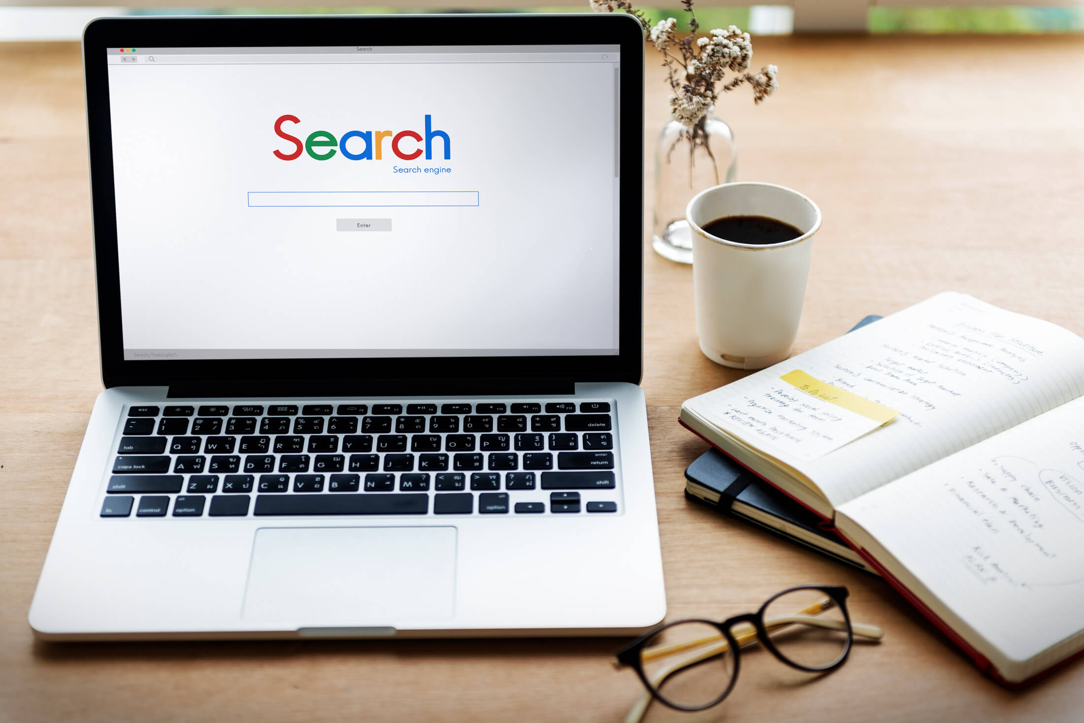 Open laptop showing a web search