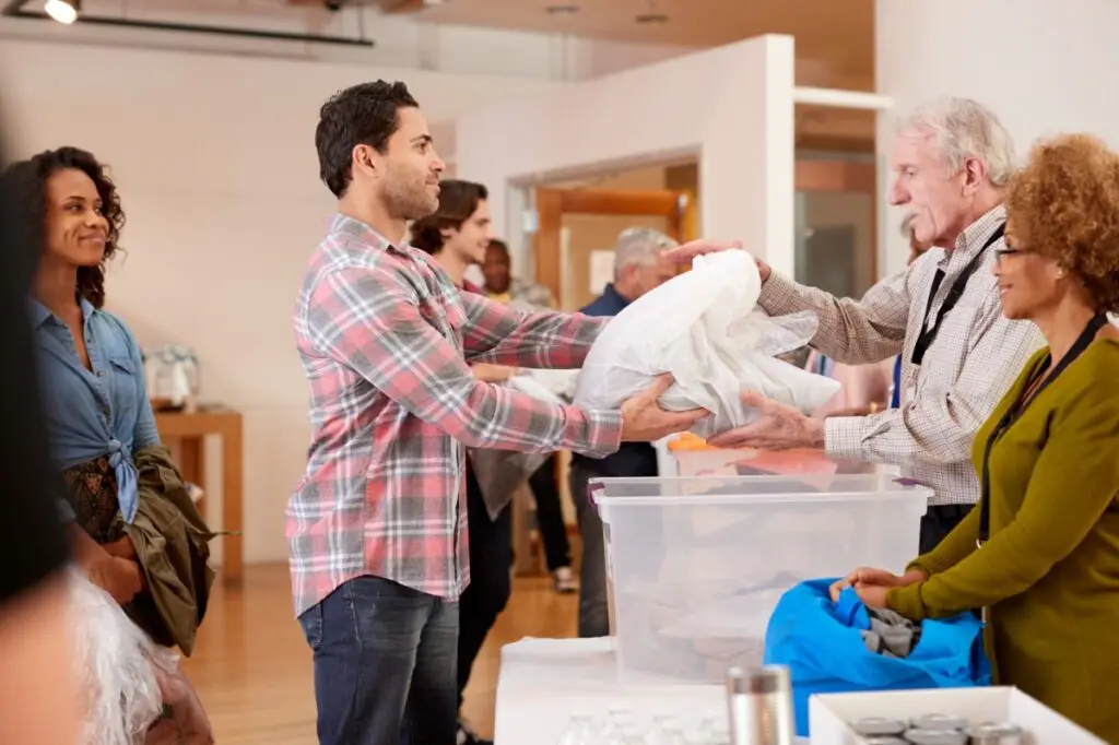 people donating at community event