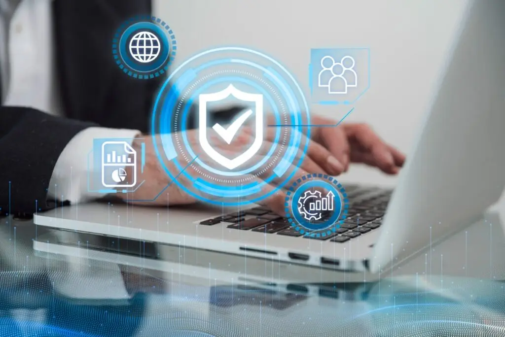 customer using computer with concept art of security icons in front