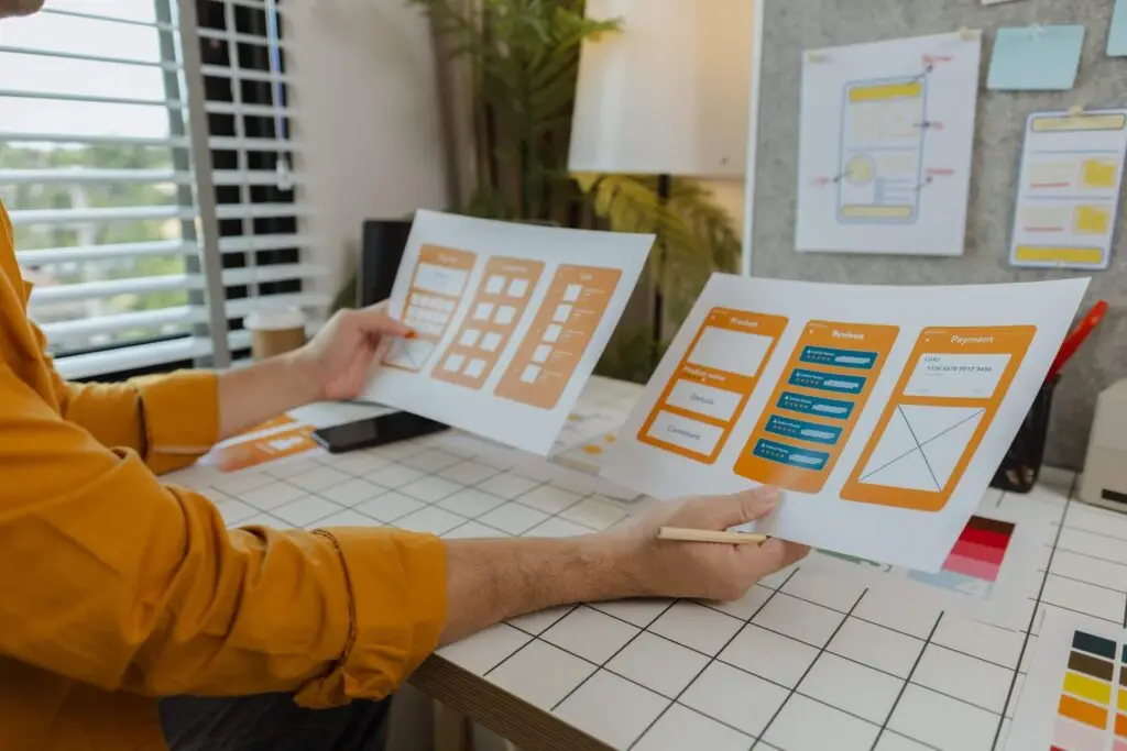 Designer looking at website wireframes