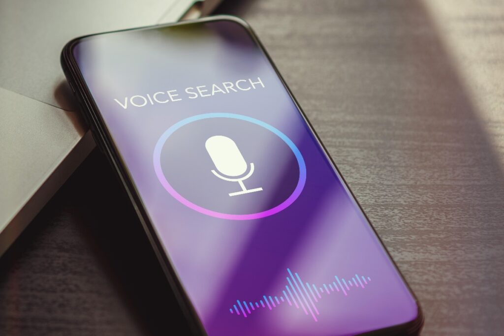 smart phone screen showing "Voice Search" icon