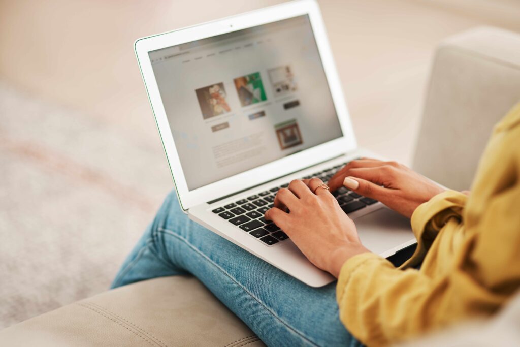 Close-up of Woman Using Laptop Computer